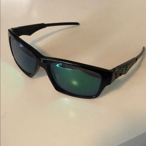 Green Oakley sunglasses